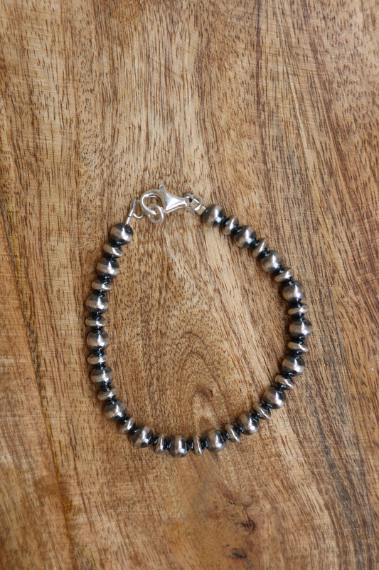 7.5" 6mm Mixed Rondelle & Machine Made Pearl Bracelet